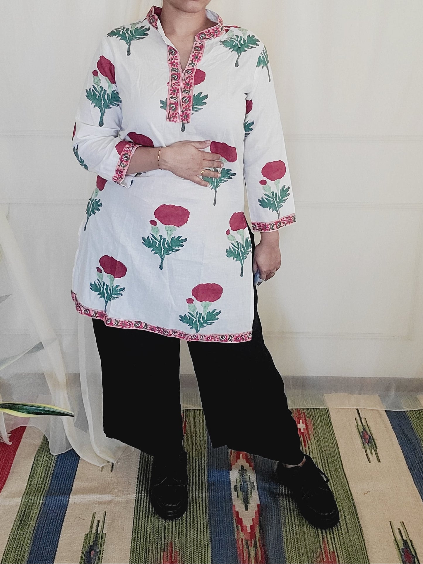 women wearing red floral block printed cotton Kurti