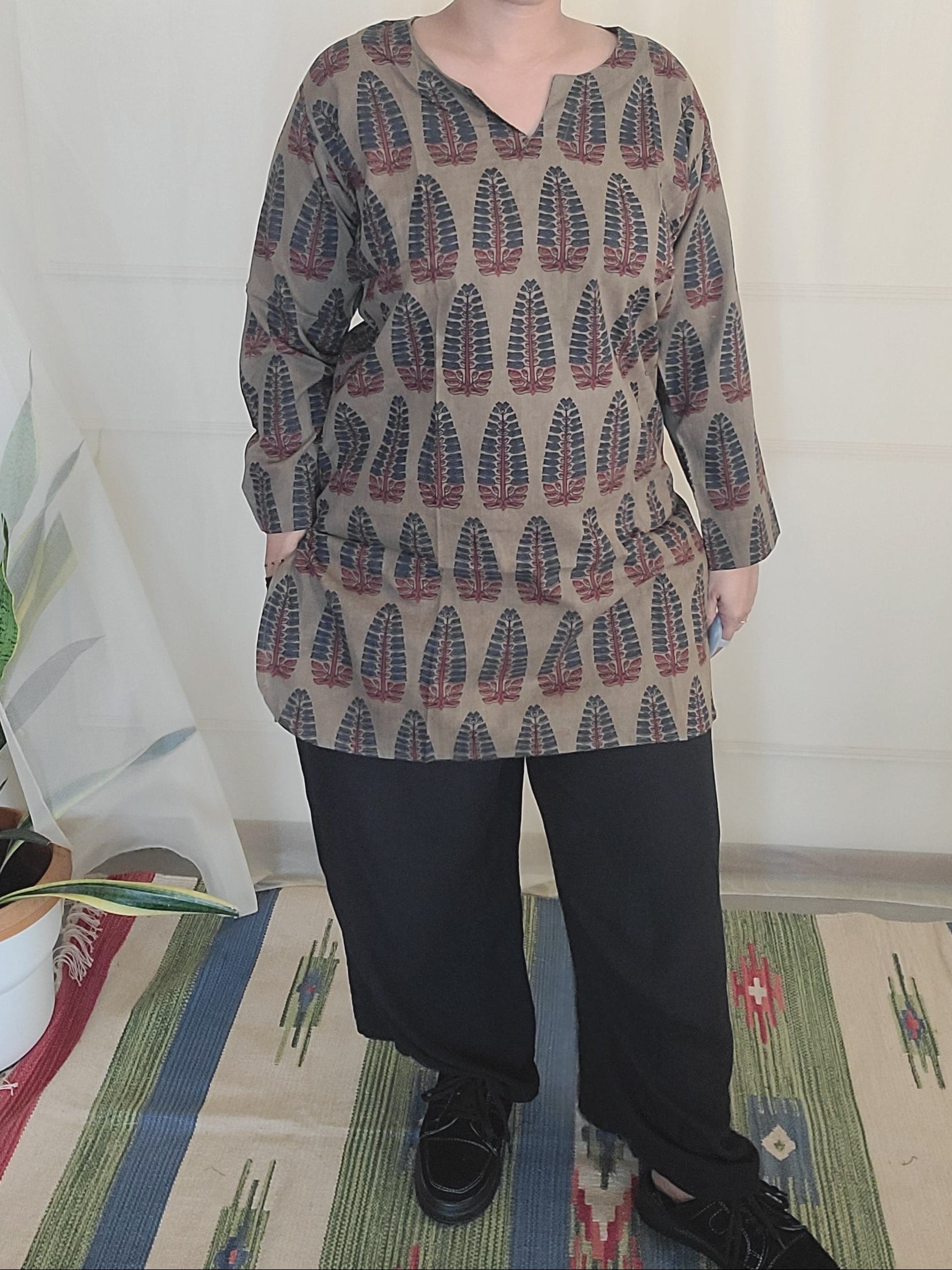 women wearing short , Block printed, cotton Kurti with leaf printed