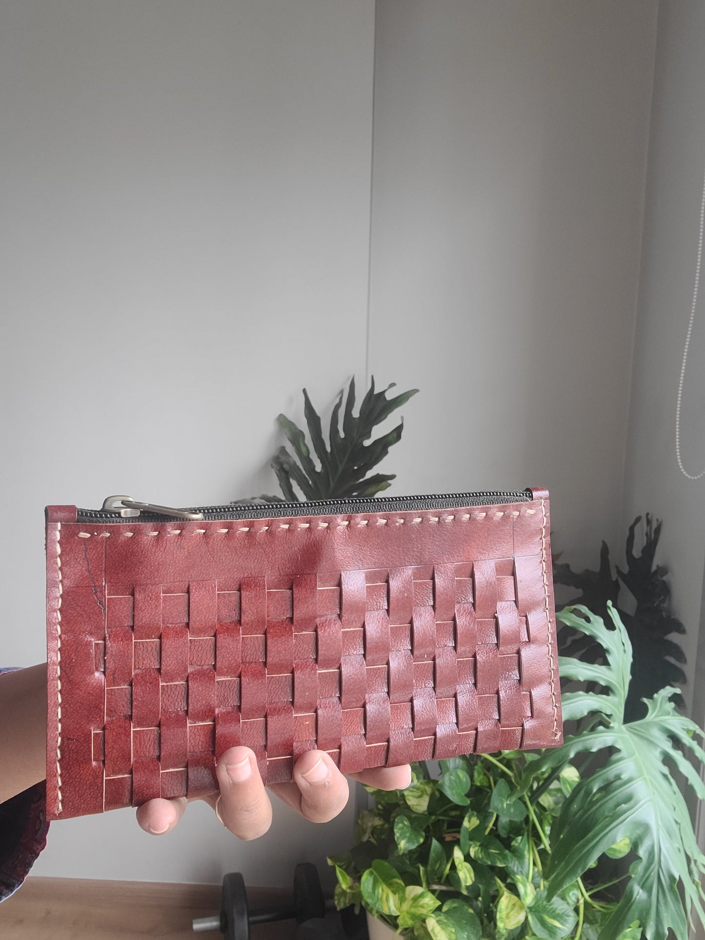 Leather pouch with checks pattern