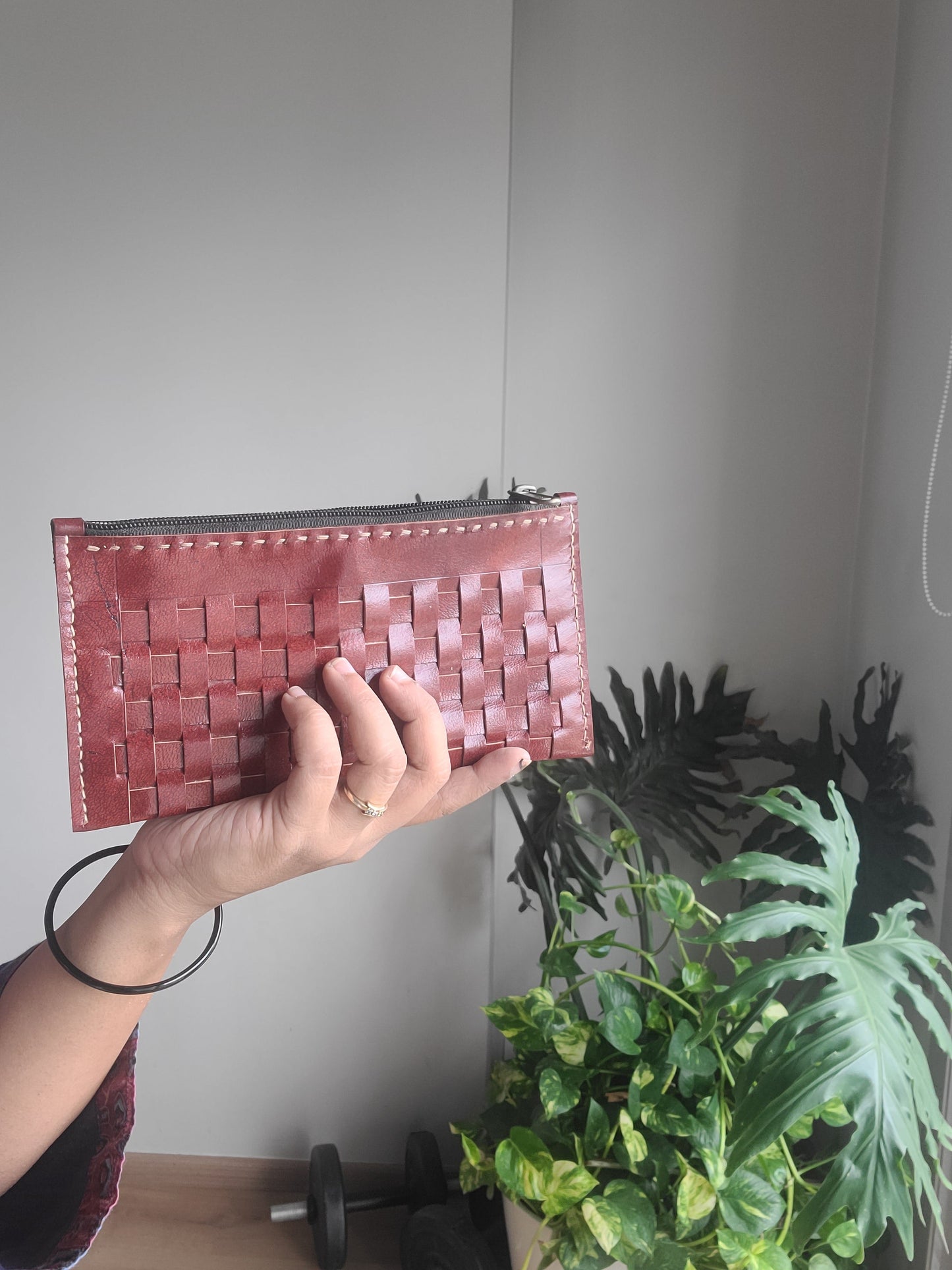 Leather pouch with checks pattern